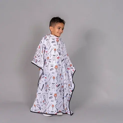 CAPA DE PELUQUERIA INFANTIL ESTAMPADA